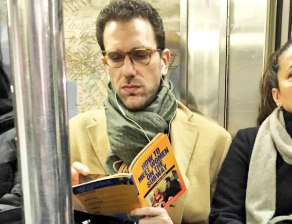Man-reading HOW-TO-MEET-WOMEN-ON-THE-SUBWAY by-Brian-Robinson 639x490