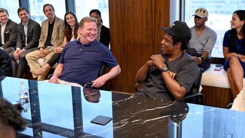 NFL commissioner, Roger Goodell (left), with hip-hop business mogul, Jay Z, announcing Jay Z's company's partnership with the NFL. 