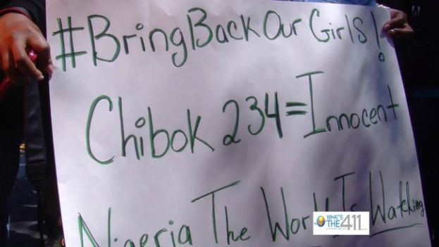 Protesters holding a sign at the rally to Bring Back Our Girls, the nearly 300 Nigerian schoolgirls kidnapped by Boko Hiram