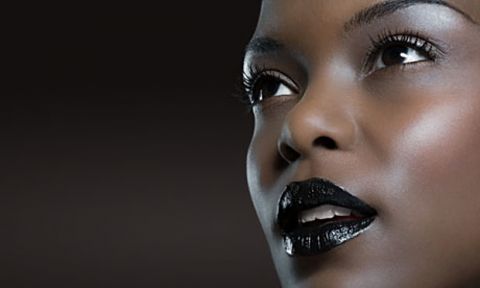 Model wearing goth-colored lipsick