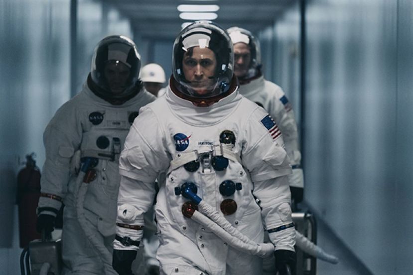 Ryan Gosling (center) stars as Neil Armstrong, the first man to step foot on the moon