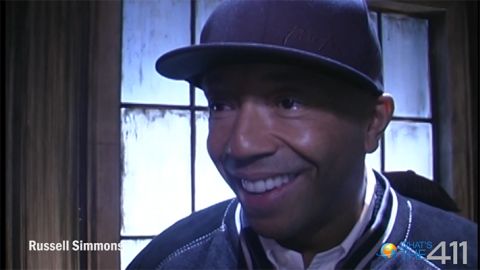 Entertainment entrepreneur Russell Simmons at a rehearsal of Def Poetry Jam talking with What's The 411 producer Ruth J Morrison