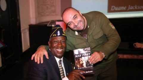 Duane Jackson (left) at his book signing party for his new book, MAY FIRST