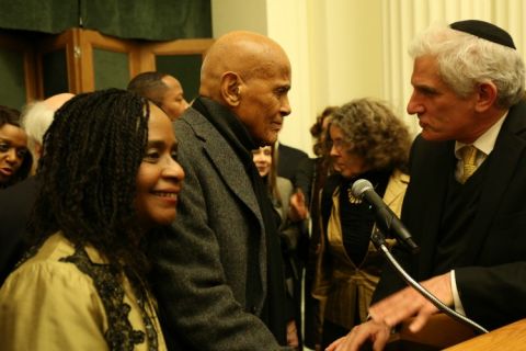 Dr. Brenda M. Greene, Executive Director, Center for Black Literature at Medgar Evers College (CUNY); and co-sponsor of opening reception of Stephen Somerstein's photo exhibit commemorating the 1965 Selma to Montgomery Civil Rights March, standing next to singer, songwriter, actor, and social activist Harry Belafonte, keynote speaker for the reception