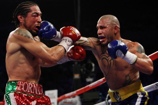 Photo: Antonio Margarito taking a punch from Miguel Cotto