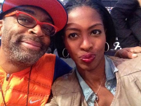 Legendary Filmmaker Spike Lee and What's The 411TV and What's The 411Sports reporter Crystal Lynn at Barclays Center for Brooklyn Nets v New York Knicks game.