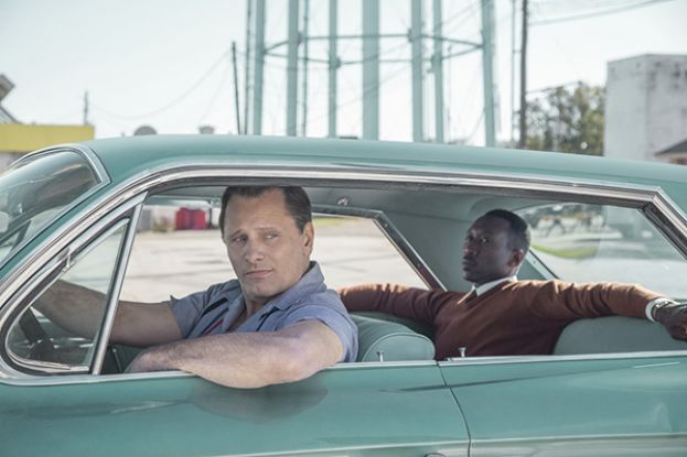Actor Viggo Mortensen (l) playing Tony Vallelonga driving Dr. Shirley played by Mahershala Ali in the movie, Green Book 