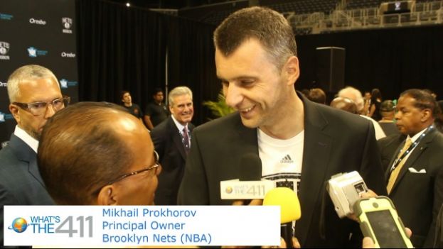 Brooklyn Nets owner Mikhail Prokhorov speaking with What&#039;s The 411 reporter Andrew Rosario