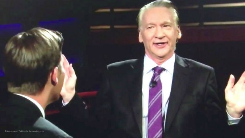 Bill Maher (facing) on the set of his show, Real Time with Bill Maher, talking with US Senator Ben Sasse.