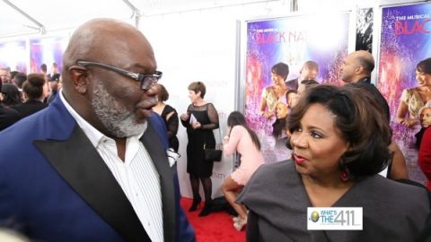 Bishop T.D. Jakes and his wife, Serita chatting on the red carpet at Black Nativity New York Premiere