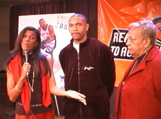 Amelia Moore, What’s The 411 co-host, interviewing New York Knicks guard Mark Jackson, and his mother at the New York Knicks Reading Zone celebration at Madison Square Garden