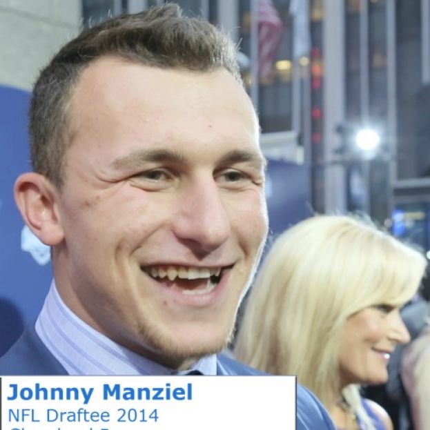 NFL Draftee Johnny Manziel talking with What&#039;s The 411 reporter Glenn Gilliam on the red carpet at the NFL Draft