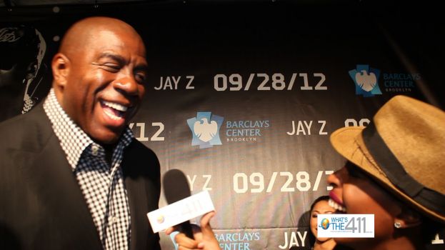 Earvin &quot;Magic&quot; Johnson talking with Crystal Lynn on the red carpet at the opening of the Barclays Center