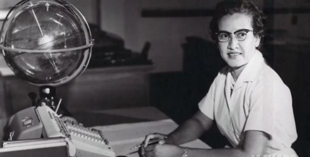 Katherine Johnson, an African-American physicist, and mathematician, at her desk at NASA